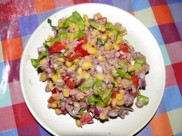 Fish salad with corn, cucumber and tuna