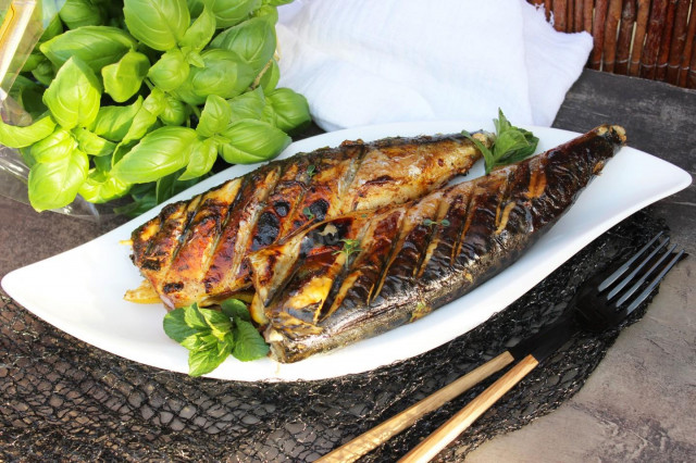 Mackerel kebab on the grill on the grill