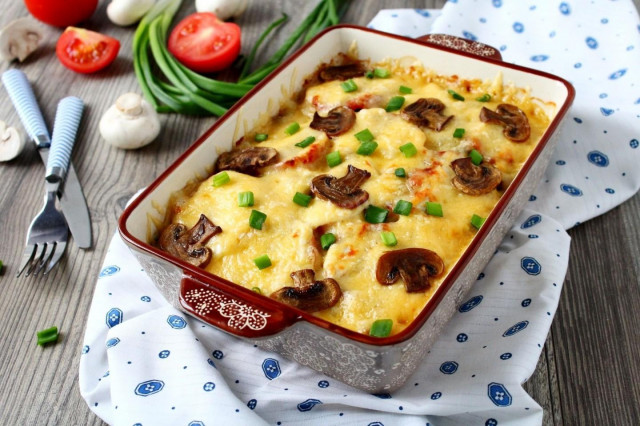 French pork meat with mushrooms in the oven