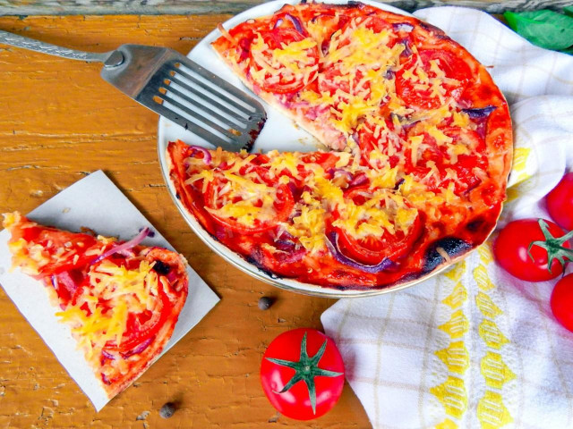 Pizza in a pan on kefir in 10 minutes