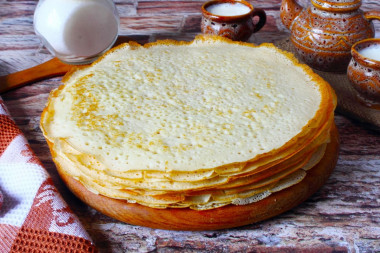 Pancakes with yeast and milk with holes