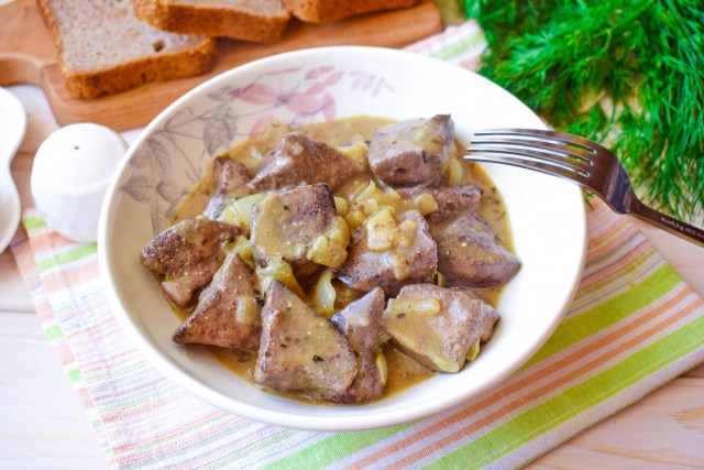 Pork liver in sour cream with onion stewed