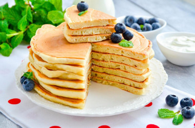 Thick fluffy pancakes on kefir