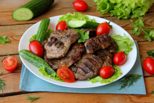 Grilled pork in a pan