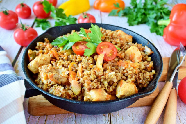 Buckwheat with chicken in a frying pan
