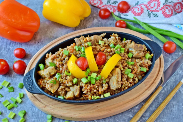 Buckwheat with pork meat in a frying pan