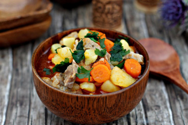 Roast in a slow cooker of pork with potatoes