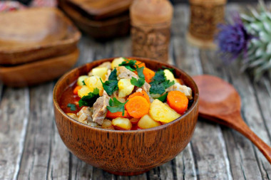 Roast in a slow cooker of pork with potatoes