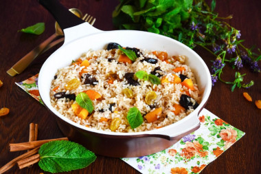 Sweet pilaf with raisins and dried apricots and dried fruits