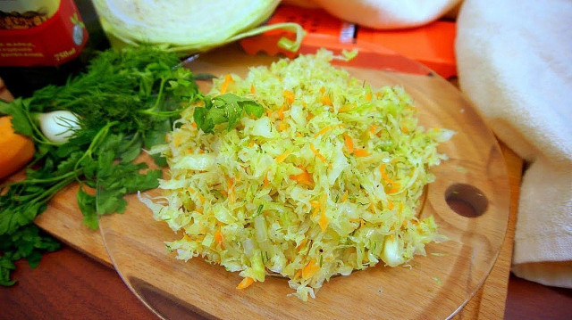 Salad of fresh cabbage and carrots with sugar