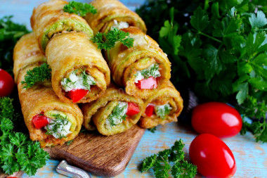 Zucchini rolls with cheese and garlic