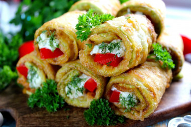 Zucchini rolls with cheese and garlic