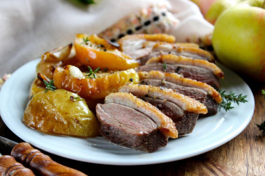 Duck breasts baked in the oven with apples