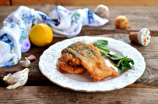 Pink salmon in batter in a frying pan