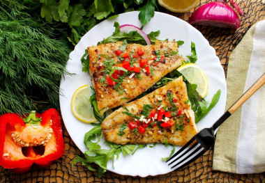 Pangasius fillet in a frying pan