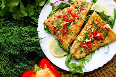 Pangasius fillet in a frying pan