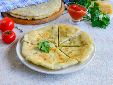 Tortillas with cottage cheese and cheese in a frying pan