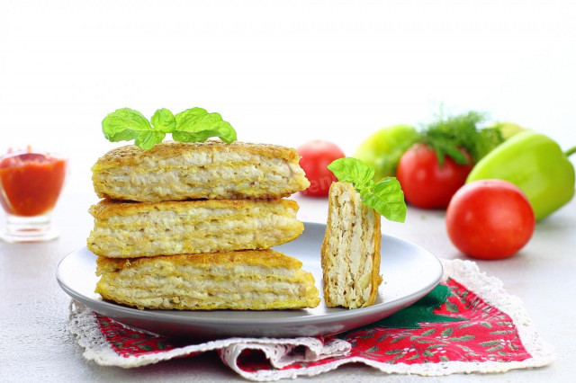 Waffle cakes with minced meat in a frying pan