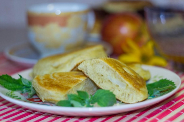 Pancakes stuffed with apples on kefir