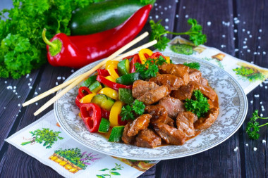 Pork in teriyaki sauce on frying pan