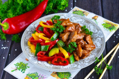 Pork in teriyaki sauce on frying pan