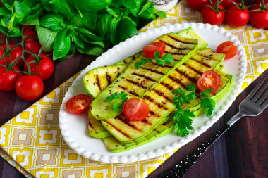 Grilled zucchini in a frying pan without oil