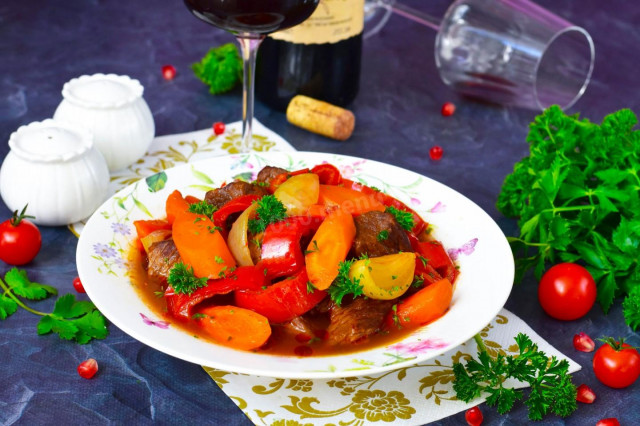 Beef with vegetables in a cauldron