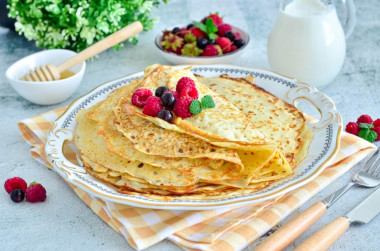 Custard pancakes with milk with holes