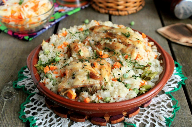Rice with vegetables and chicken in the oven