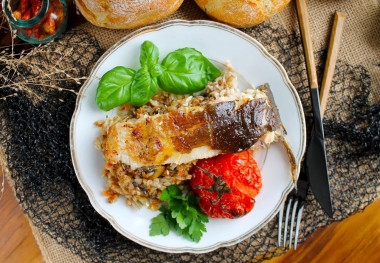 Whole stuffed carp baked in the oven