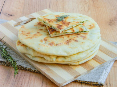 Tortillas with cottage cheese in a pan on kefir