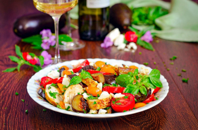 Warm salad with chicken eggplant and tomatoes