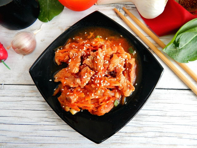 Meat in Chinese sweet sauce in a frying pan