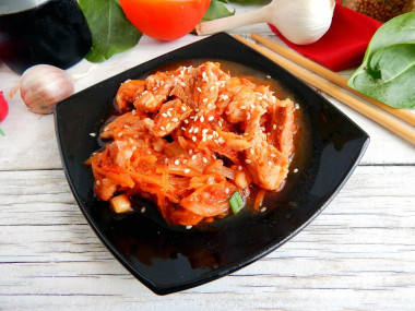 Meat in Chinese sweet sauce in a frying pan