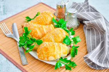 Chicken drumstick in puff pastry in the oven