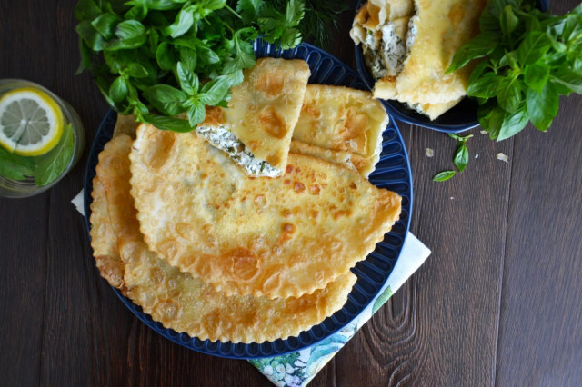 Chebureks with cottage cheese and herbs