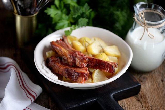 Potatoes with pork belly in the oven