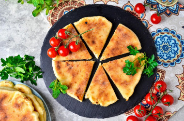 Khachapuri on kefir with cottage cheese in a frying pan