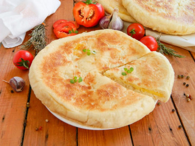 Ossetian cheese pies in a frying pan