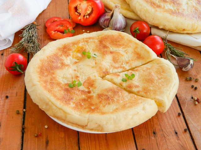 Ossetian cheese pies in a frying pan