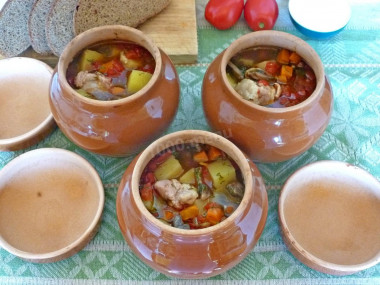 Soup in pots in the oven