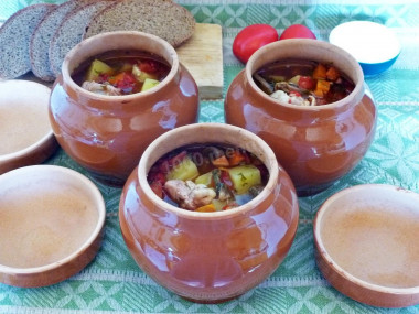 Soup in pots in the oven