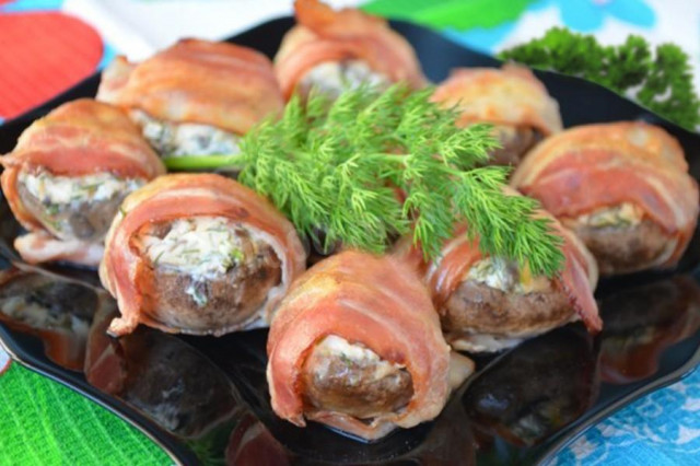 Mushrooms baked in bacon in the oven