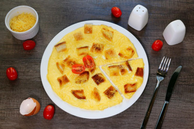 Omelet with bread in a pan