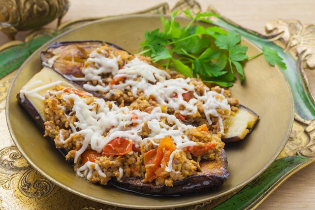 Eggplant with tomatoes, minced meat and cheese