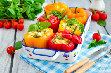 Stuffed peppers with rice and vegetables in the oven