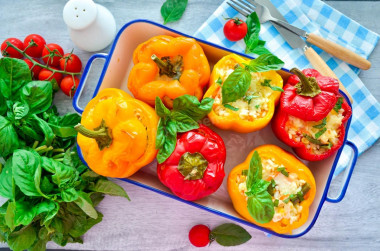 Stuffed peppers with rice and vegetables in the oven