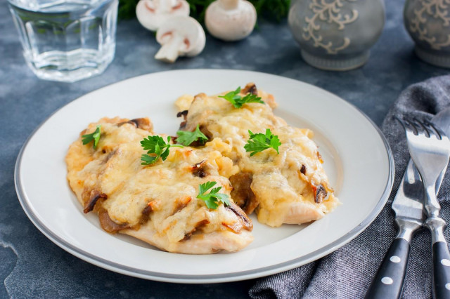 Chicken chops with mushrooms and cheese