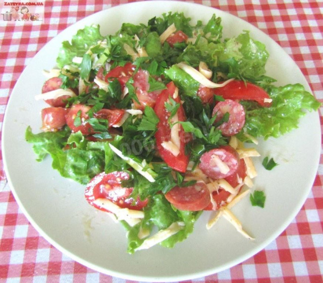 Salad with cheese and hunting sausages