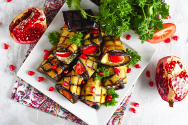 Eggplant tongues with garlic and tomatoes appetizer